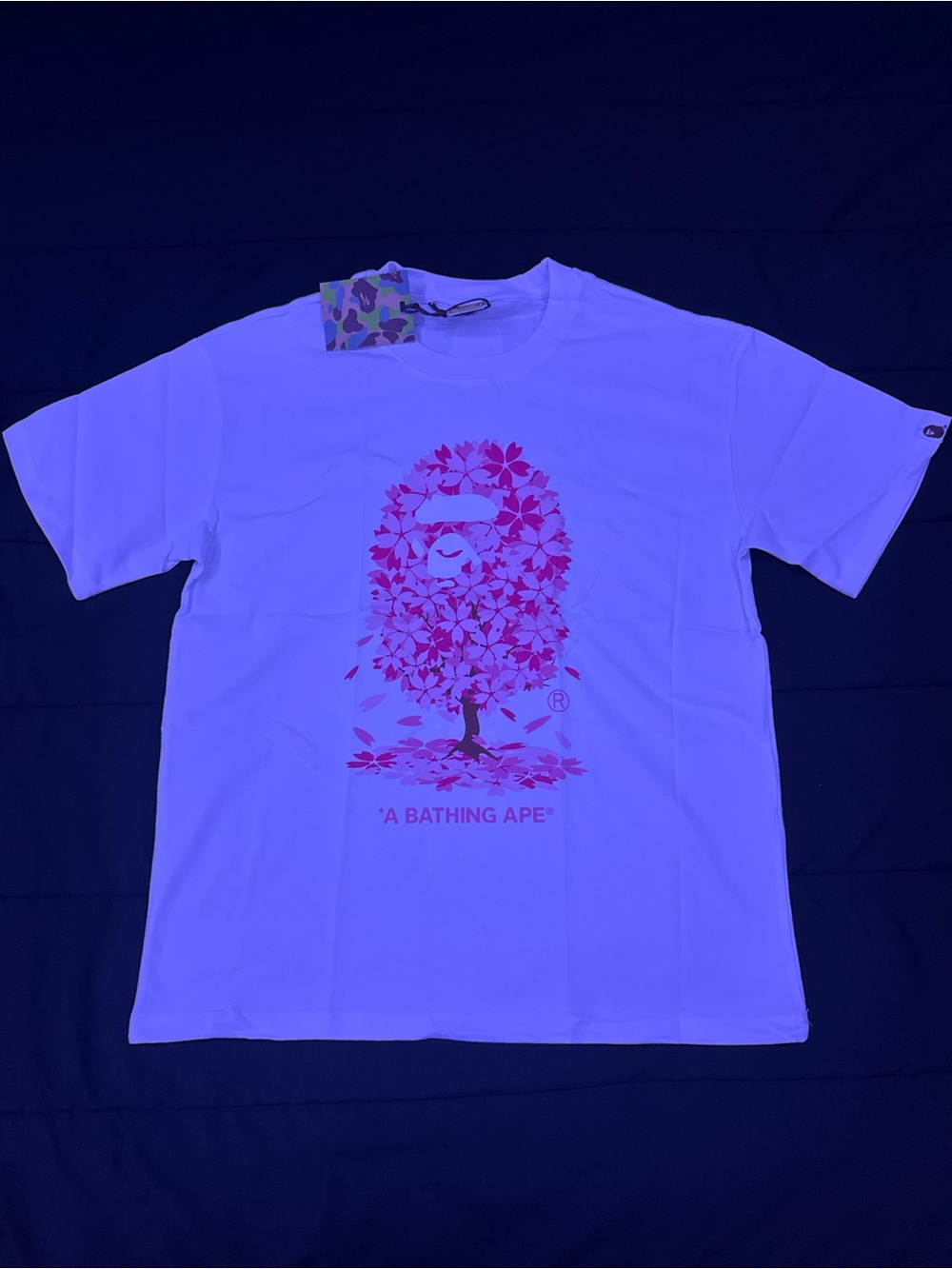 A Bathing Ape White Short Sleeve Tee with Pink Sakura Graphic